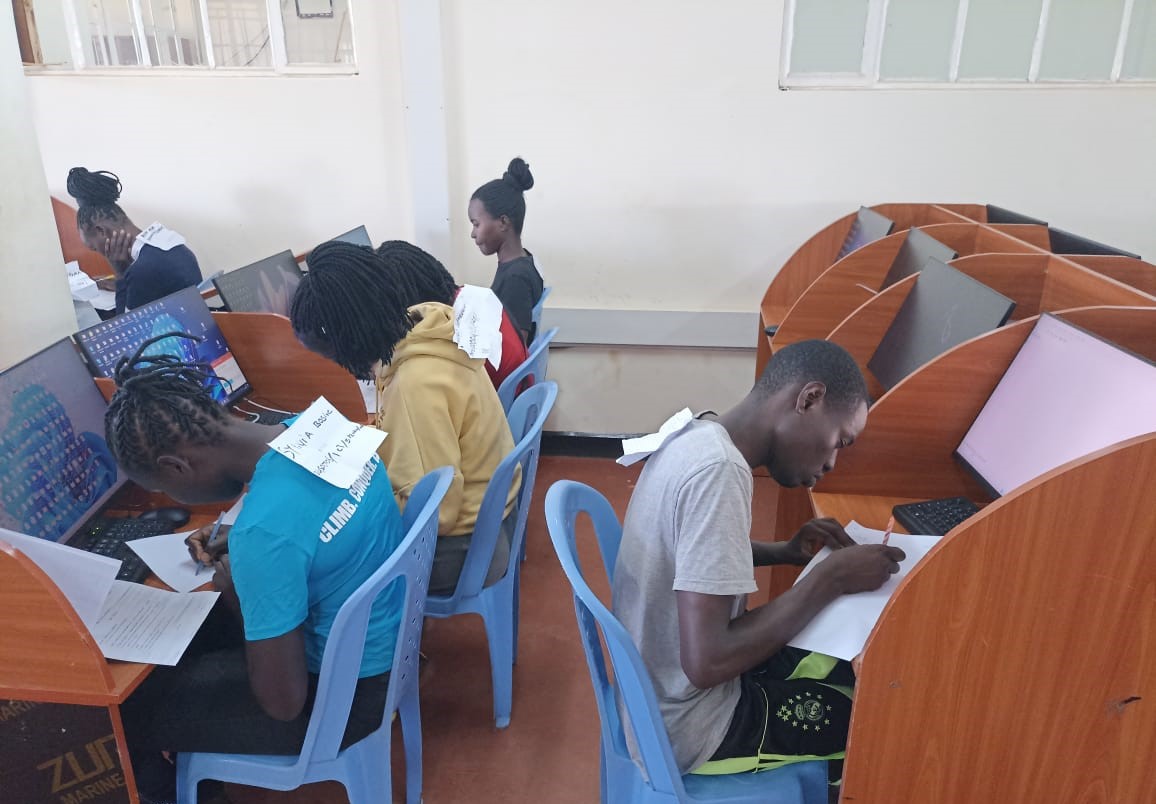 Assorted computer peripherals like a mouse, keyboard, and headset.